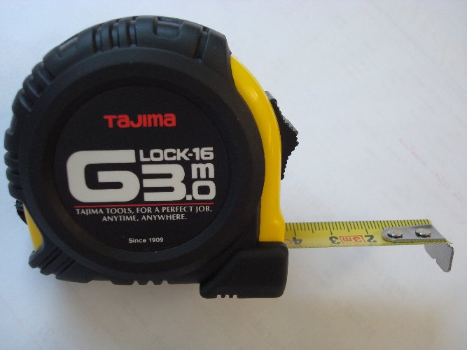 Flexómetro antideslizante Tajima G-LOCK 10m foto del producto Vista Principal L